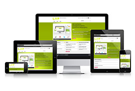 A desktop monitor, tablets, and smartphones displaying the same website, illustrating responsive web design.