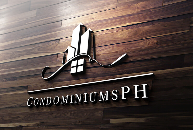The Condominiums PH logo rendered in silver metallic on a dark wood slat wall background.