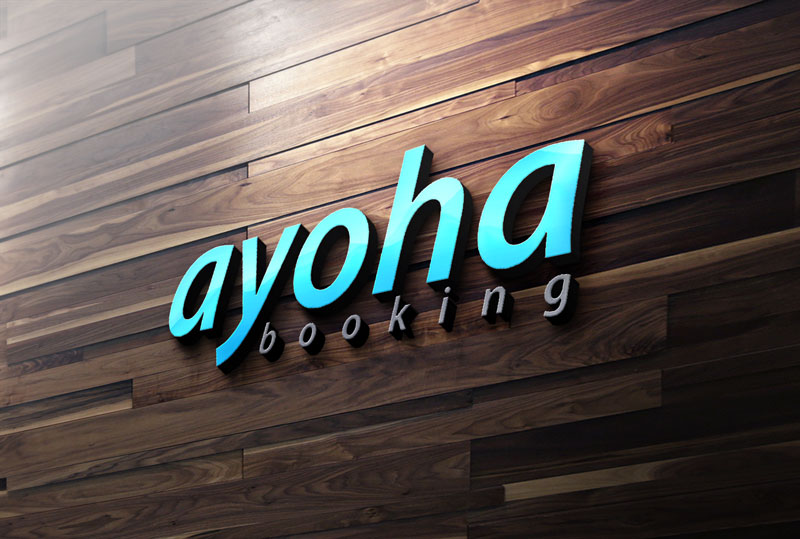 A 3D sign with the blue text "ayoha booking" mounted on a dark brown wooden slat wall.