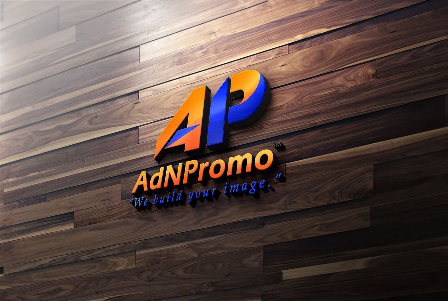AdNPromo 3D logo rendered on a dark horizontal wood plank wall mockup.