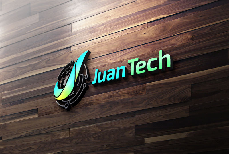 A 3D company logo reading "Juan Tech" with a swoosh and circuit board icon mounted on a wood-paneled wall.