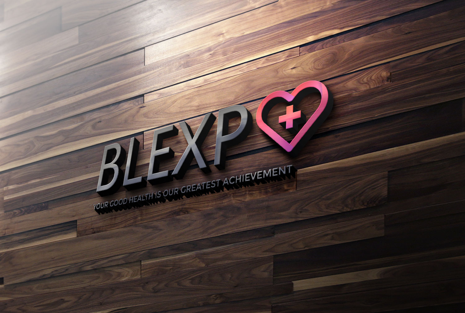 A 3D company logo reading "BLEXP" with a heart and plus sign symbol on a dark wood-paneled wall, accompanied by the tagline "YOUR GOOD HEALTH IS OUR GREATEST ACHIEVEMENT".