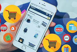 A person holding a white smartphone displaying an e-commerce website, surrounded by colorful shopping icons.