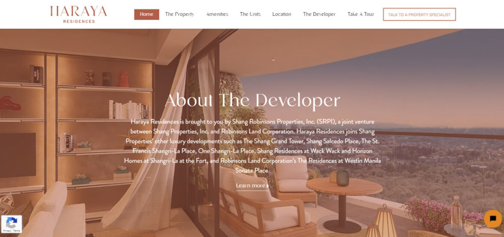 Haraya Residences website showcasing a modern interior and a balcony overlooking a city view at sunset.
